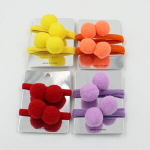 Λαστιχάκια μαλλιών με χνουδωτά pom pom